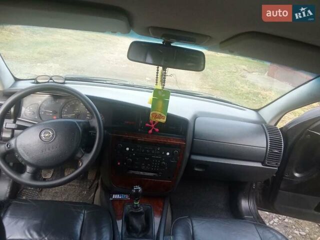 Черный Опель Омега, объемом двигателя 2.2 л и пробегом 220 тыс. км за 2700 $, фото 12 на Automoto.ua