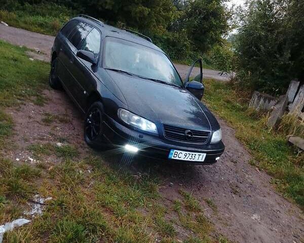 Чорний Опель Омега, об'ємом двигуна 2.2 л та пробігом 220 тис. км за 3300 $, фото 10 на Automoto.ua