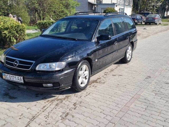 Черный Опель Омега, объемом двигателя 2.2 л и пробегом 175 тыс. км за 1500 $, фото 1 на Automoto.ua