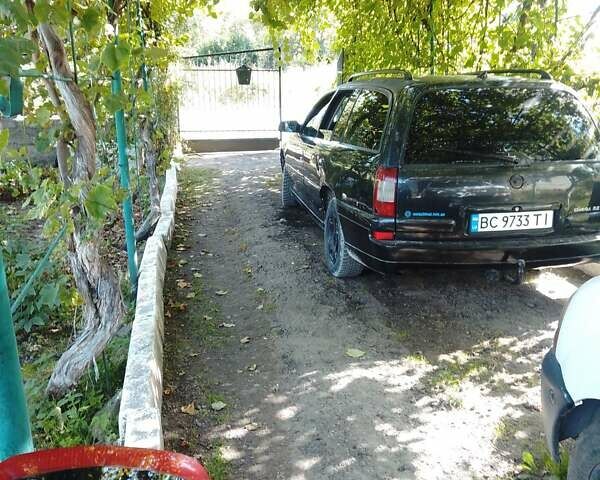Чорний Опель Омега, об'ємом двигуна 2.2 л та пробігом 220 тис. км за 3300 $, фото 8 на Automoto.ua