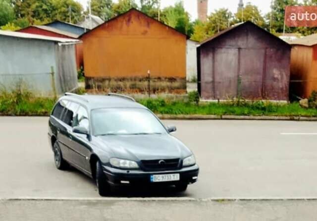 Черный Опель Омега, объемом двигателя 2.2 л и пробегом 220 тыс. км за 2700 $, фото 5 на Automoto.ua