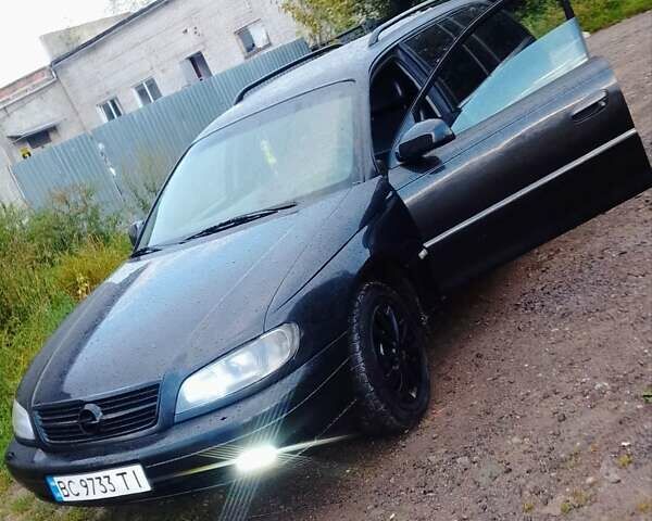 Чорний Опель Омега, об'ємом двигуна 2.2 л та пробігом 220 тис. км за 3300 $, фото 5 на Automoto.ua