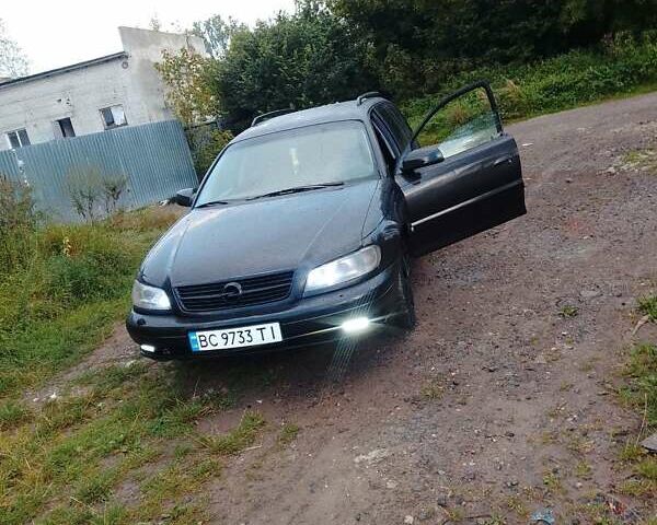 Чорний Опель Омега, об'ємом двигуна 2.2 л та пробігом 220 тис. км за 3300 $, фото 11 на Automoto.ua