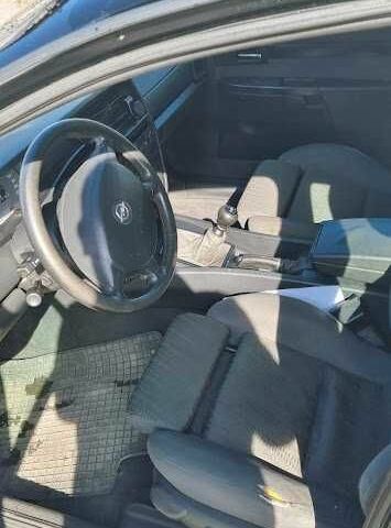 Черный Опель Омега, объемом двигателя 2.2 л и пробегом 175 тыс. км за 1500 $, фото 6 на Automoto.ua