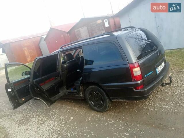 Черный Опель Омега, объемом двигателя 2.2 л и пробегом 220 тыс. км за 2700 $, фото 7 на Automoto.ua