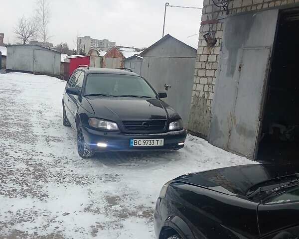 Черный Опель Омега, объемом двигателя 2.2 л и пробегом 335 тыс. км за 1800 $, фото 1 на Automoto.ua