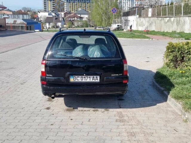 Черный Опель Омега, объемом двигателя 2.2 л и пробегом 175 тыс. км за 1500 $, фото 2 на Automoto.ua