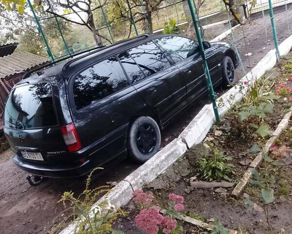 Черный Опель Омега, объемом двигателя 2.2 л и пробегом 220 тыс. км за 3000 $, фото 5 на Automoto.ua