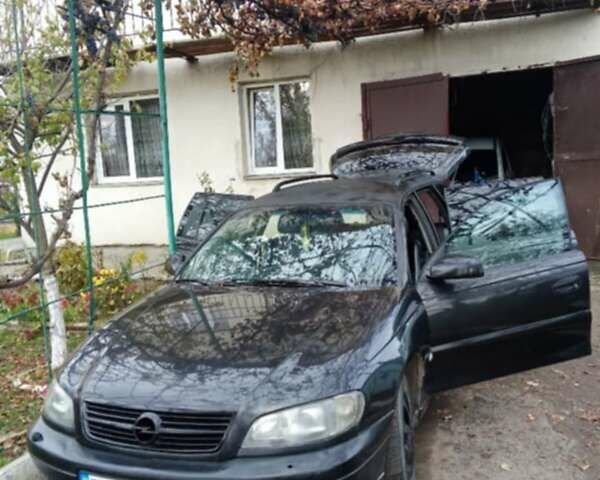 Черный Опель Омега, объемом двигателя 2.2 л и пробегом 220 тыс. км за 2700 $, фото 10 на Automoto.ua