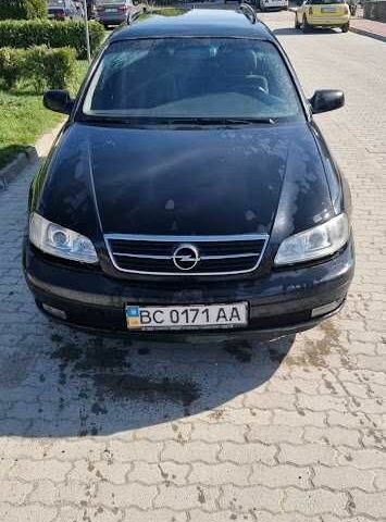 Черный Опель Омега, объемом двигателя 2.2 л и пробегом 175 тыс. км за 1500 $, фото 5 на Automoto.ua