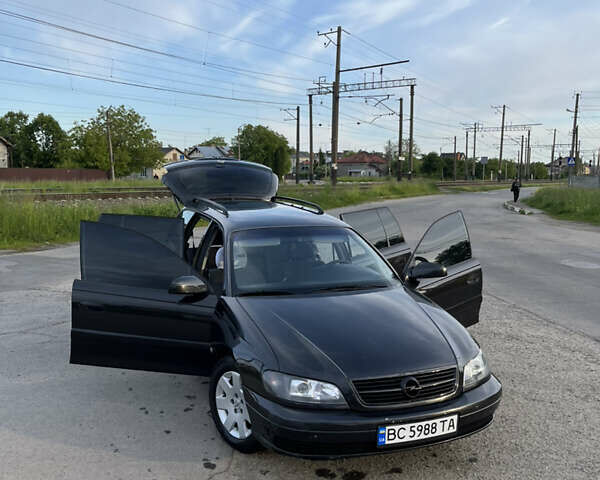 Чорний Опель Омега, об'ємом двигуна 2.2 л та пробігом 285 тис. км за 4000 $, фото 14 на Automoto.ua