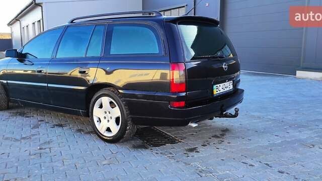 Черный Опель Омега, объемом двигателя 2.5 л и пробегом 288 тыс. км за 4800 $, фото 7 на Automoto.ua