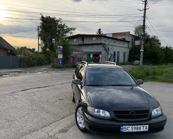 Чорний Опель Омега, об'ємом двигуна 2.2 л та пробігом 285 тис. км за 4000 $, фото 17 на Automoto.ua