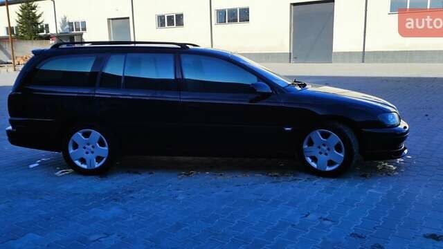 Черный Опель Омега, объемом двигателя 2.5 л и пробегом 288 тыс. км за 4800 $, фото 6 на Automoto.ua