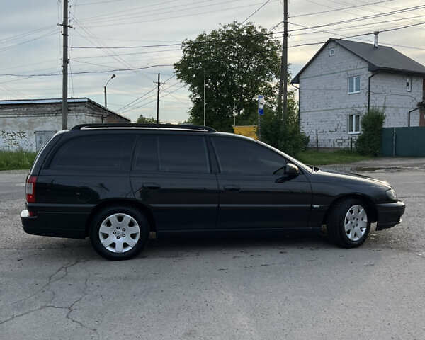 Чорний Опель Омега, об'ємом двигуна 2.2 л та пробігом 285 тис. км за 4000 $, фото 2 на Automoto.ua