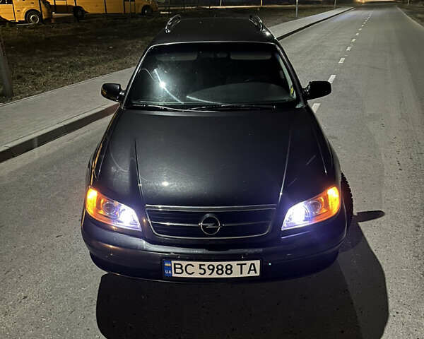 Чорний Опель Омега, об'ємом двигуна 2.2 л та пробігом 285 тис. км за 4000 $, фото 26 на Automoto.ua
