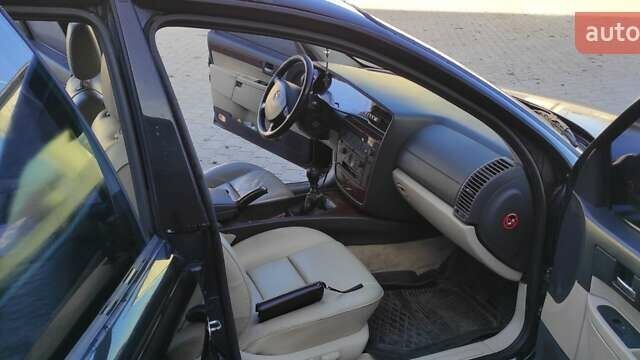 Черный Опель Омега, объемом двигателя 2.5 л и пробегом 288 тыс. км за 4800 $, фото 21 на Automoto.ua