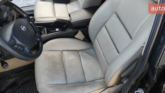 Черный Опель Омега, объемом двигателя 2.5 л и пробегом 288 тыс. км за 4800 $, фото 14 на Automoto.ua