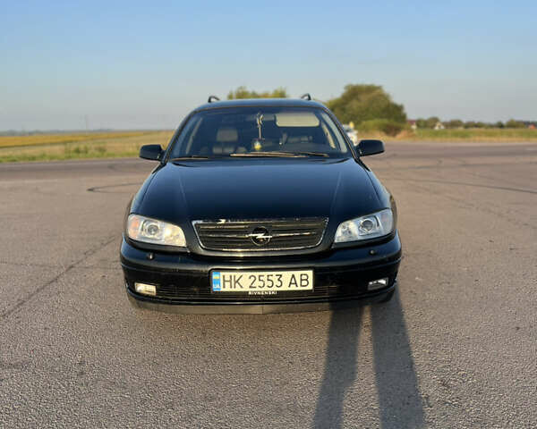 Черный Опель Омега, объемом двигателя 2.5 л и пробегом 431 тыс. км за 4444 $, фото 2 на Automoto.ua
