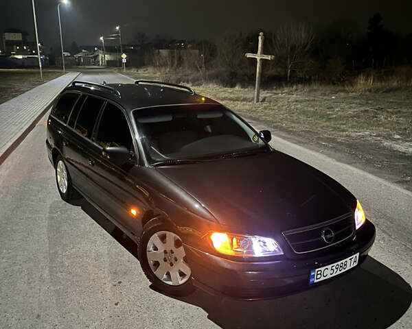 Чорний Опель Омега, об'ємом двигуна 2.2 л та пробігом 285 тис. км за 4000 $, фото 20 на Automoto.ua