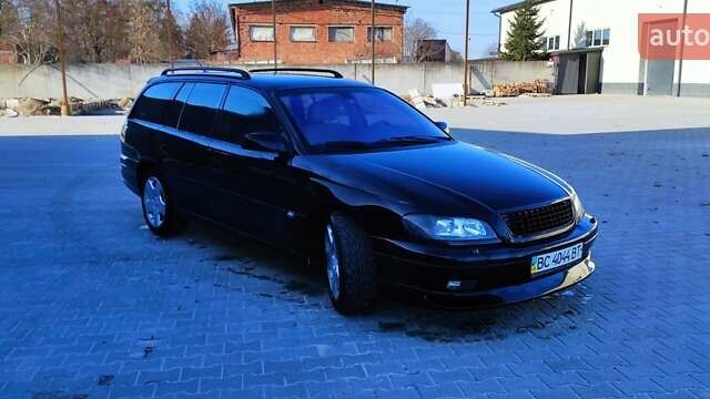 Черный Опель Омега, объемом двигателя 2.5 л и пробегом 288 тыс. км за 4800 $, фото 4 на Automoto.ua