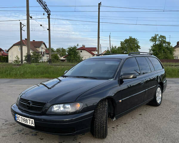 Чорний Опель Омега, об'ємом двигуна 2.2 л та пробігом 285 тис. км за 4000 $, фото 10 на Automoto.ua