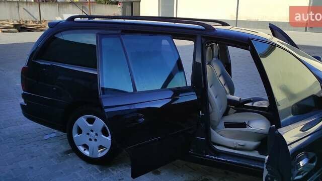 Черный Опель Омега, объемом двигателя 2.5 л и пробегом 288 тыс. км за 4800 $, фото 20 на Automoto.ua