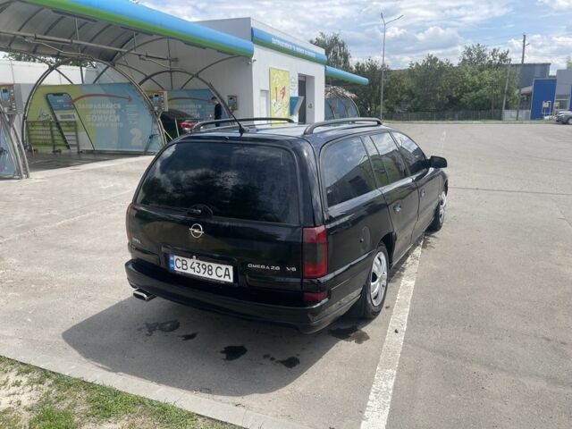 Чорний Опель Омега, об'ємом двигуна 2.6 л та пробігом 340 тис. км за 2300 $, фото 7 на Automoto.ua