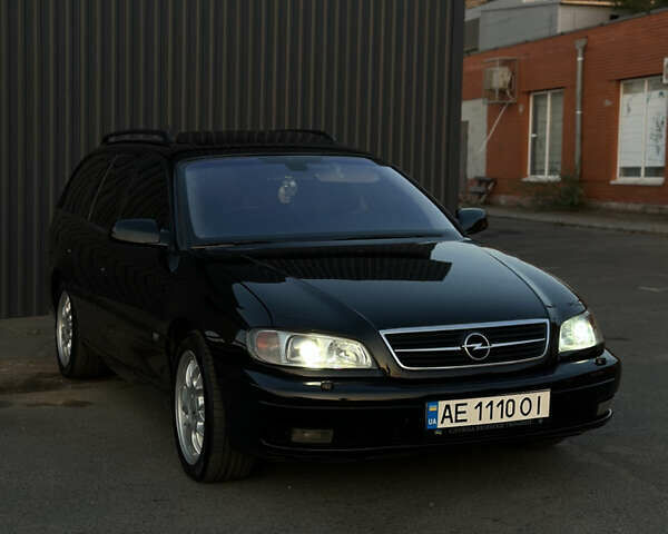 Черный Опель Омега, объемом двигателя 2.5 л и пробегом 330 тыс. км за 6000 $, фото 5 на Automoto.ua