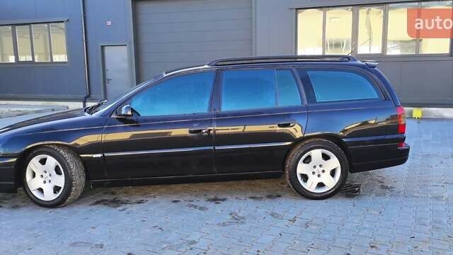 Черный Опель Омега, объемом двигателя 2.5 л и пробегом 288 тыс. км за 4800 $, фото 8 на Automoto.ua