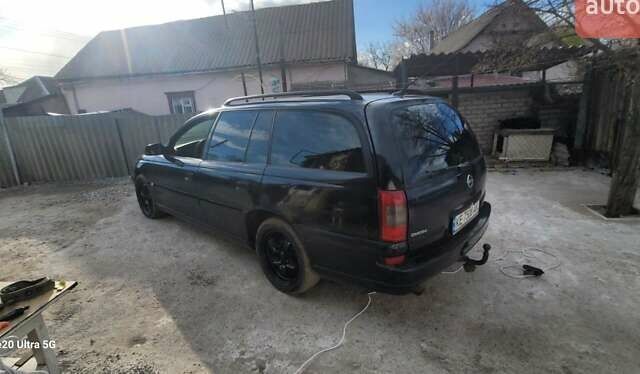 Черный Опель Омега, объемом двигателя 2.2 л и пробегом 260 тыс. км за 3100 $, фото 3 на Automoto.ua