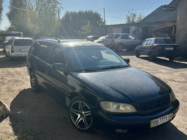 Черный Опель Омега, объемом двигателя 2.5 л и пробегом 350 тыс. км за 3500 $, фото 3 на Automoto.ua