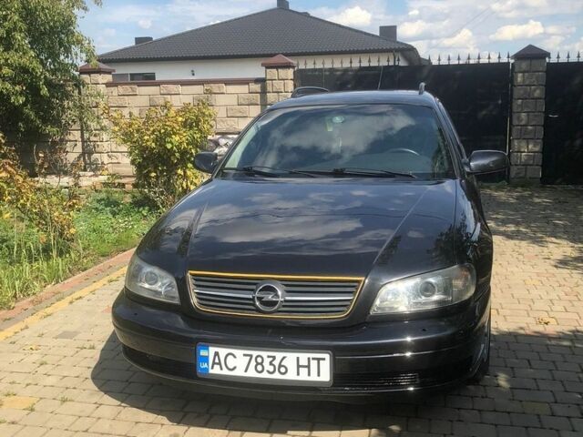 Черный Опель Омега, объемом двигателя 2.2 л и пробегом 395 тыс. км за 3400 $, фото 1 на Automoto.ua