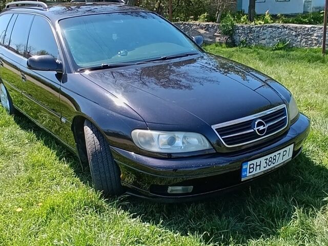 Черный Опель Омега, объемом двигателя 2.2 л и пробегом 330 тыс. км за 4000 $, фото 2 на Automoto.ua