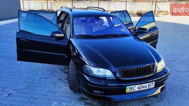 Черный Опель Омега, объемом двигателя 2.5 л и пробегом 288 тыс. км за 4800 $, фото 18 на Automoto.ua