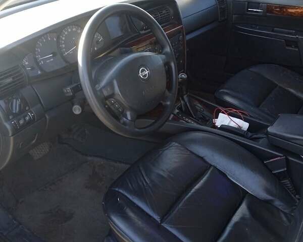 Черный Опель Омега, объемом двигателя 2.5 л и пробегом 334 тыс. км за 4200 $, фото 15 на Automoto.ua