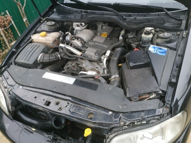 Черный Опель Омега, объемом двигателя 2.2 л и пробегом 350 тыс. км за 3300 $, фото 5 на Automoto.ua