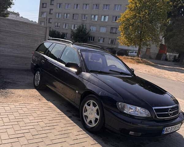 Черный Опель Омега, объемом двигателя 2.2 л и пробегом 330 тыс. км за 3500 $, фото 3 на Automoto.ua