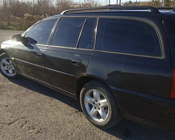 Черный Опель Омега, объемом двигателя 2.5 л и пробегом 334 тыс. км за 4200 $, фото 3 на Automoto.ua