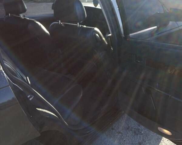 Черный Опель Омега, объемом двигателя 2.5 л и пробегом 334 тыс. км за 4200 $, фото 5 на Automoto.ua