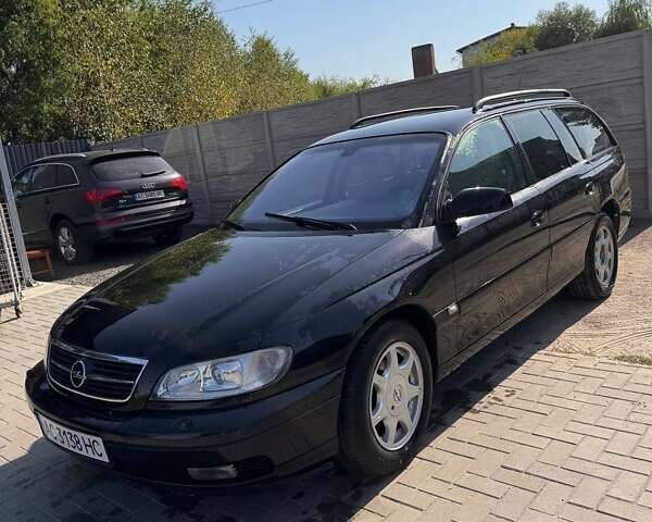 Черный Опель Омега, объемом двигателя 2.2 л и пробегом 330 тыс. км за 3500 $, фото 4 на Automoto.ua