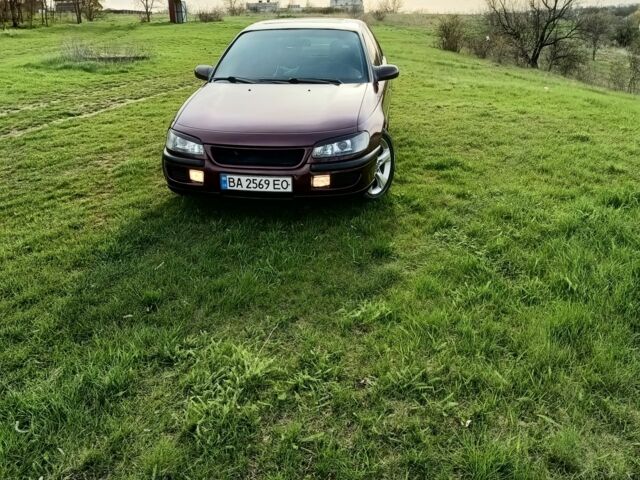 Фиолетовый Опель Омега, объемом двигателя 2.5 л и пробегом 250 тыс. км за 4200 $, фото 4 на Automoto.ua