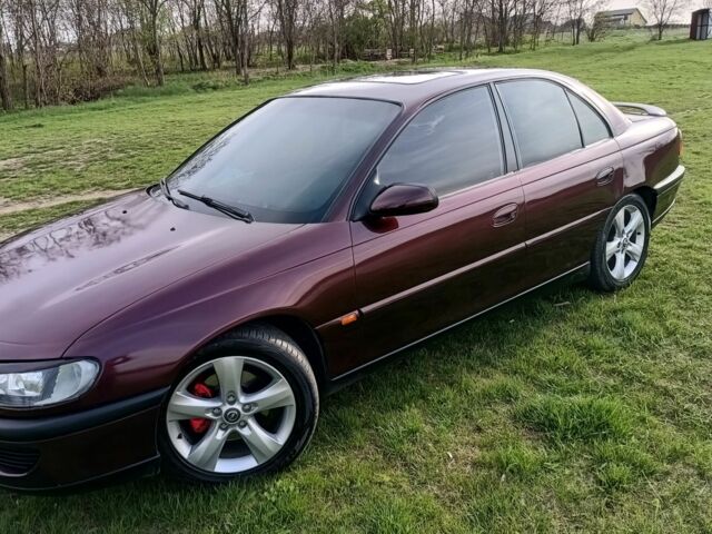 Фиолетовый Опель Омега, объемом двигателя 2.5 л и пробегом 250 тыс. км за 4200 $, фото 8 на Automoto.ua