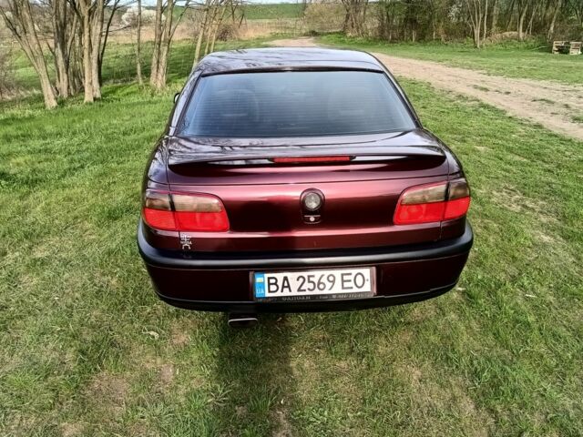 Фиолетовый Опель Омега, объемом двигателя 2.5 л и пробегом 250 тыс. км за 4200 $, фото 16 на Automoto.ua