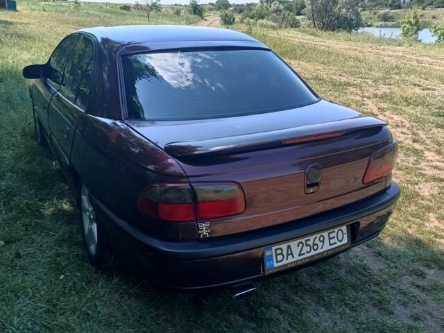 Фиолетовый Опель Омега, объемом двигателя 2.5 л и пробегом 250 тыс. км за 4200 $, фото 1 на Automoto.ua