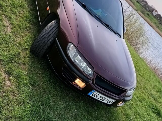 Фиолетовый Опель Омега, объемом двигателя 2.5 л и пробегом 250 тыс. км за 4200 $, фото 9 на Automoto.ua