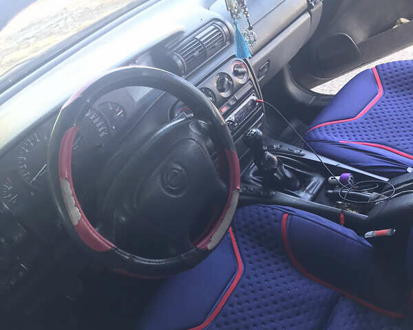 Фиолетовый Опель Омега, объемом двигателя 2.5 л и пробегом 300 тыс. км за 1900 $, фото 7 на Automoto.ua