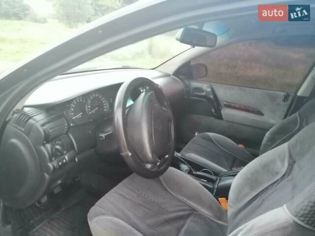Фиолетовый Опель Омега, объемом двигателя 2 л и пробегом 270 тыс. км за 2000 $, фото 8 на Automoto.ua