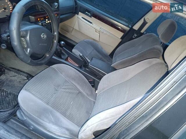 Фіолетовий Опель Омега, об'ємом двигуна 2.2 л та пробігом 256 тис. км за 1650 $, фото 3 на Automoto.ua