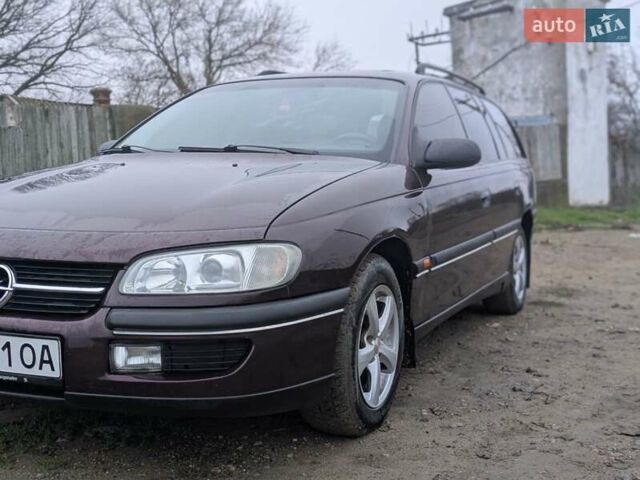 Фіолетовий Опель Омега, об'ємом двигуна 2 л та пробігом 350 тис. км за 2600 $, фото 2 на Automoto.ua